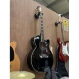 AN EPIPHONE BLACK GLOSS EJ200. SCE GUITAR, TOGETHER WITH CASE