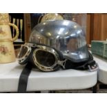 A CHROME STYLE PILOT'S HELMET