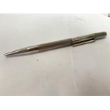 A HALLMARKED SILVER PROPELLING PENCIL