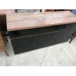 A BLACK SIDEBOARD WITH THREE DRAWERS, THREE DOORS AND A WOODEN TOP