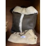 A UGG HANDBAG AND STORAGE BAG