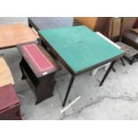 A MAHOGANY MAGAZINE RACK TABLE WITH RED LEATHER TOP, A FOLDING CARD TABLE AND A WHITE TABLE