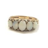 A LADIES 9CT YELLOW GOLD FIVE STONE OPAL RING, WEIGHT 3.8G