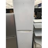 AN INDESIT FRIDGE FREEZER