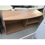 A PINE EFFECT CABINET WITH FOUR SHELVES