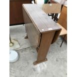 A FORMICA DROP LEAF TABLE