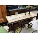 A TIN METAL STEAM WAGON MODEL