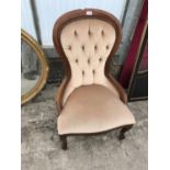 A MAHOGANY BUTTON BACK BEDROOM CHAIR