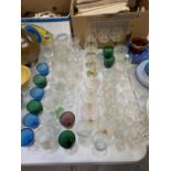 A LARGE COLLECTION OF GLASSWARE AND COLOURED GLASSES ETC