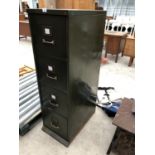 A GREEN METAL VINTAGE FOUR DRAWER FILING CABINET