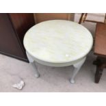 A SMALL CIRCULAR PAINTED COFFEE TABLE