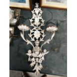 A DECORATIVE FLORAL METAL TWIN BRANCH CANDLE HOLDER