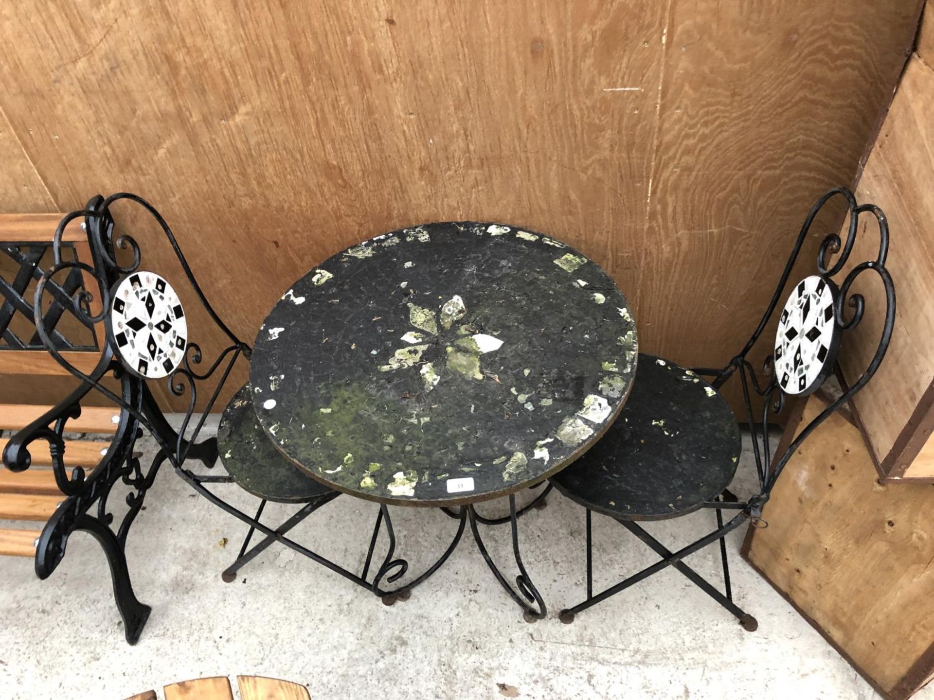 A VINTAGE GARDEN TABLE AND TWO CHAIRS