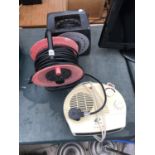 TWO EXTENSION REELS AND HEATER IN WORKING ORDER