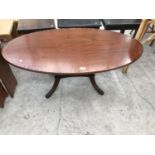 AN INLAID MAHOGANY OVAL COFFEE TABLE