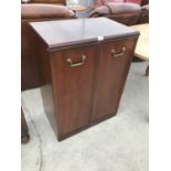 A MAHOGANY TWO DOOR CUPBOARD