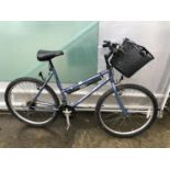 AN OUTLOOK DIAMOND BACK BIKE WITH BASKET