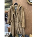 A LONG LADIES FUR JACKET