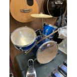 A SMALL BURSWOOD DRUM KIT TOGETHER WITH STICKS