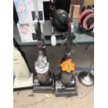 TWO DYSON VACUUM CLEANERS IN WORKING ORDER