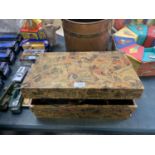 A SMALL ORNATE PAINTED PINE CHEST CONTAINING VARIOUS DECORATIVE GLASSES ETC