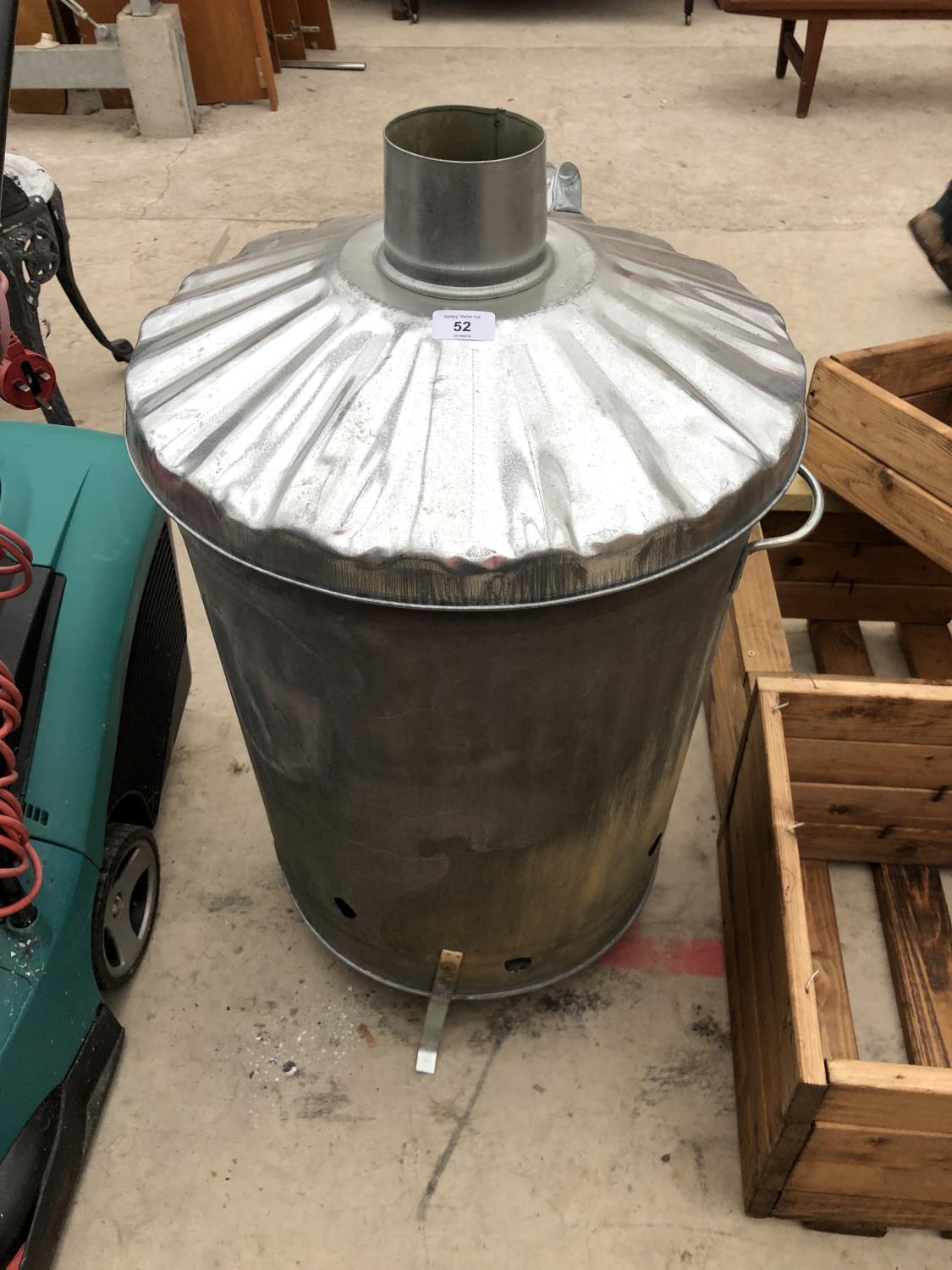 A GALVANISED METAL BRAZIER