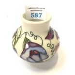 A SMALL MOORCROFT SWEETNESS VASE