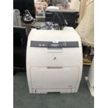 A HP COLOUR LASER JET PRINTER IN WORKING ORDER