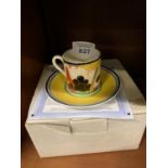 A LIMITED EDITION 'SUMMERHOUSE' CLARICE CLIFF CUP AND SAUCER WITH CERTIFICATE AND BOX