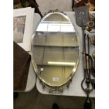 AN ART NOUVEAU STYLE BEVEL EDGED MIRROR