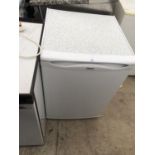 A UNDERCOUNTER HOTPOINT FRIDGE