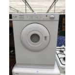 A HOTPOINT DRYER IN WORKING ORDER