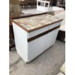 A TILE TOP EFFECT KITCHEN UNIT WITH TWO DOORS AND TWO DRAWERS