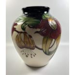 A MOORCROFT POTTERY 'ANNA LILY' PATTERN VASE, HEIGHT 21CM