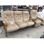 A CINTIQUE THREE SEATER SOFA AND MATCHING ELECTRIC RECLINING ARMCHAIR