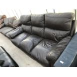 A BROWN LEATHER THREE SEATER SOFA