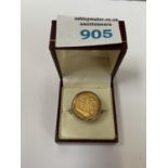 A 22CT GOLD 1899 HALF SOVEREIGN MADE IN TO A RING WITH A 9CT GOLD MOUNT, WEIGHT 9.1 G