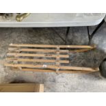 A PILZ DAVOS WOODEN SLEDGE