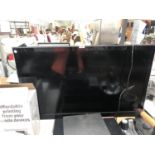 AN LG FLAT SCREEN TV IN WORKING ORDER