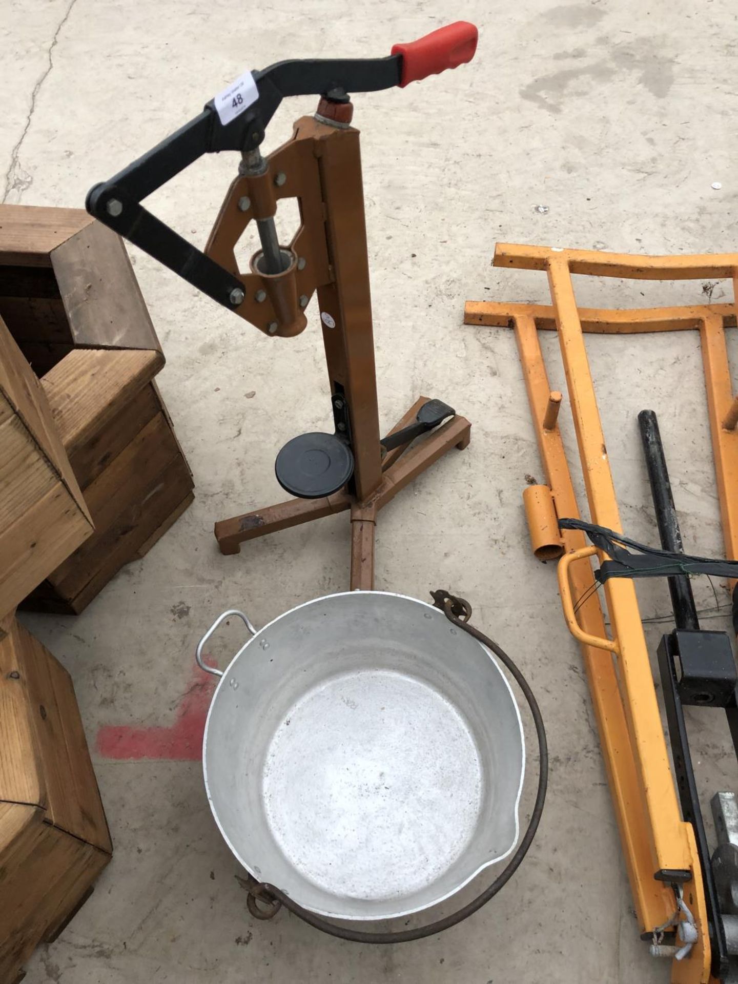 A CORKING MACHINE AND BUCKET