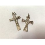 TWO SILVER CROSS PENDANTS