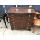 A MAHOGANY SERPENTINE FRONT CHEST OF FOUR DRAWERS