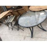 A CIRCULAR TOPPED TABLE AND FURTHER GARDEN TABLE AND CHAIR SET