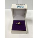 A 9CT GOLD BOXED DOLPHIN RING, 1G WEIGHT
