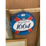 A COLLECTABLE METAL BEER BOTTLE CAP 'KRONENBOURG 1664' SIGN