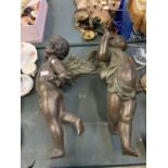 A VINTAGE CHERUB GARDEN FIGURE