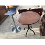 A BLACK LEATHER BAR STOOL AND TEAK BISTRO TABLE