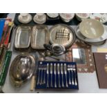 A LARGE MIXED LOT OF SILVER PLATED ITEMS - CASED FLATWARE SETS ETC