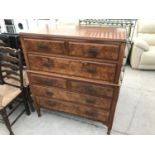A MAHOGANY AND WALNUT CHEST ON CHEST WITH FOUR SHORT AND THREE LONG DRAWERS