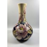 A MOORCROFT POTTERY 'Magnolia' TRIAL PATTERN VASE, HEIGHT 24CM